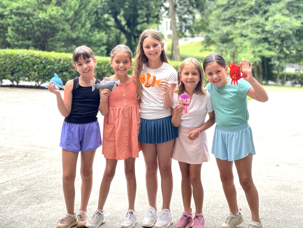 Campers with felt nature crafts